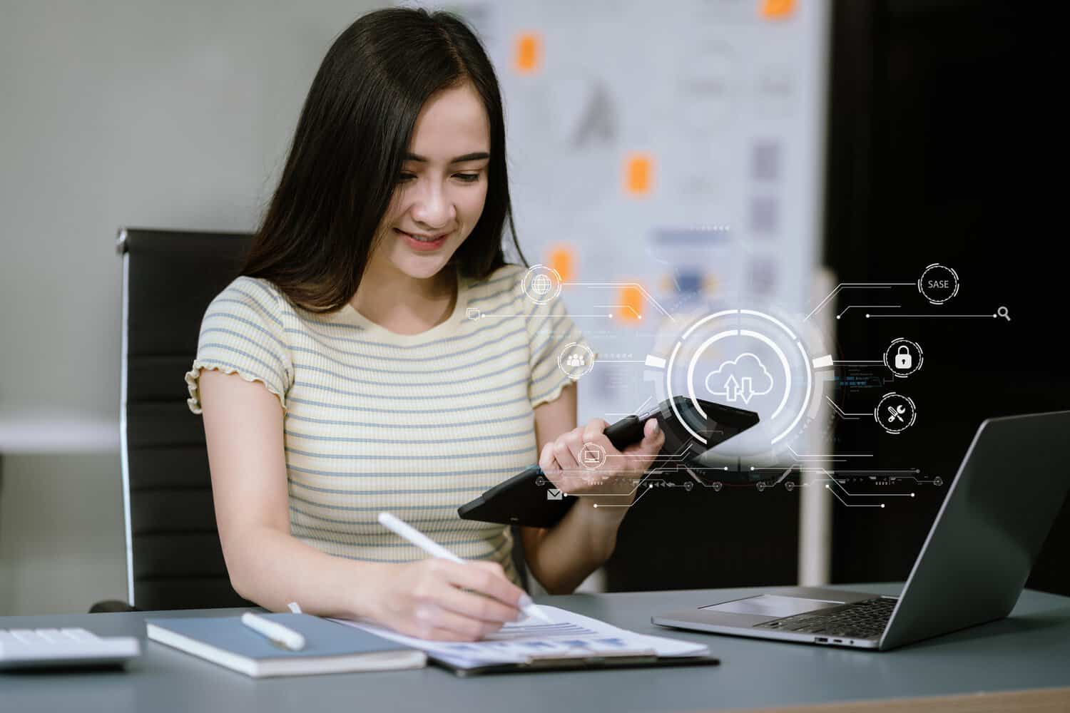 A businesswoman taking proper steps on how to protect customer data under Malaysia’s PDPA.