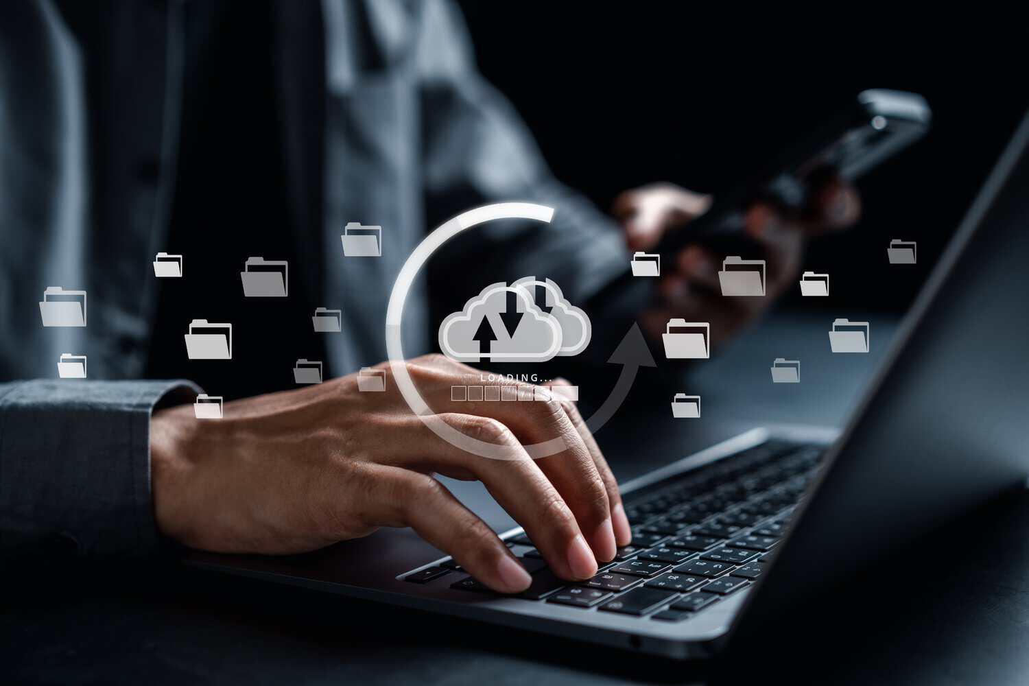 Visualisation of a businessman using cloud disaster recovery software for retail stores.
