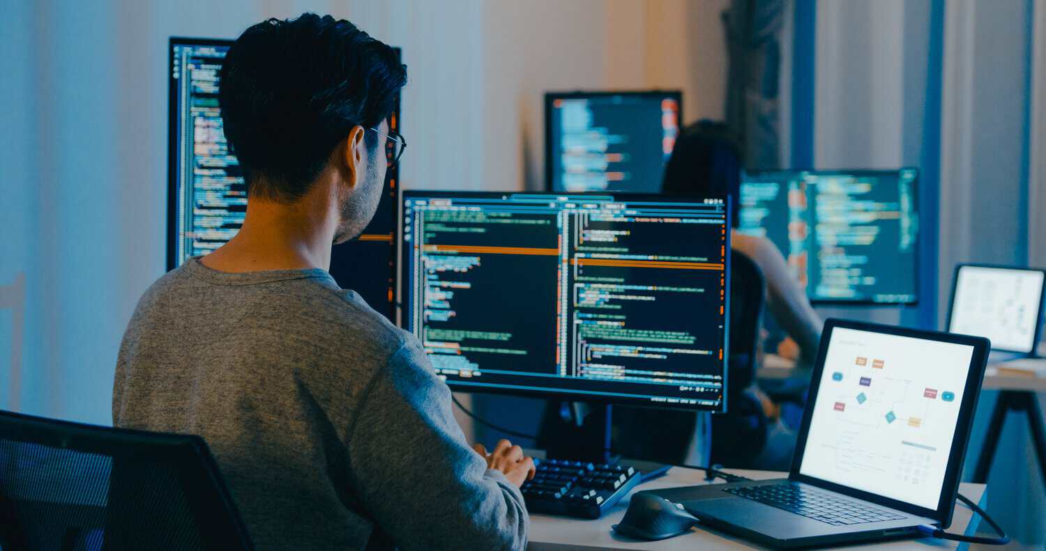 An in-house IT technician at work. Moving your IT infrastructure to the cloud can save costs.