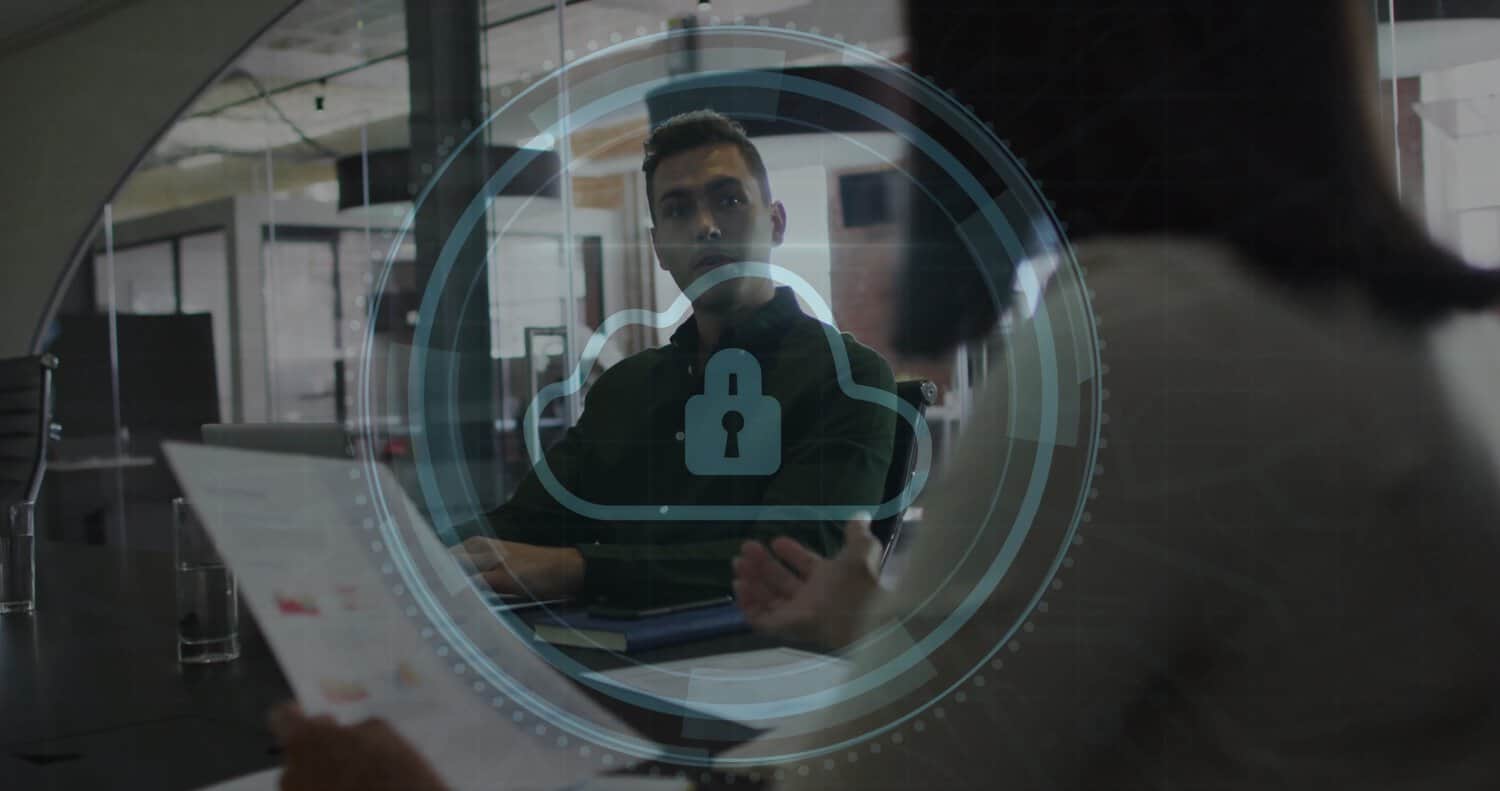 Enterprise IT architect reviewing a hybrid cloud diagram on a whiteboard, working through a multi cloud migration playbook.
